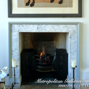 Artwork above open fireplace with lit fire